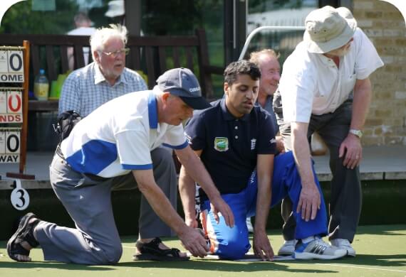 men playing Bowls