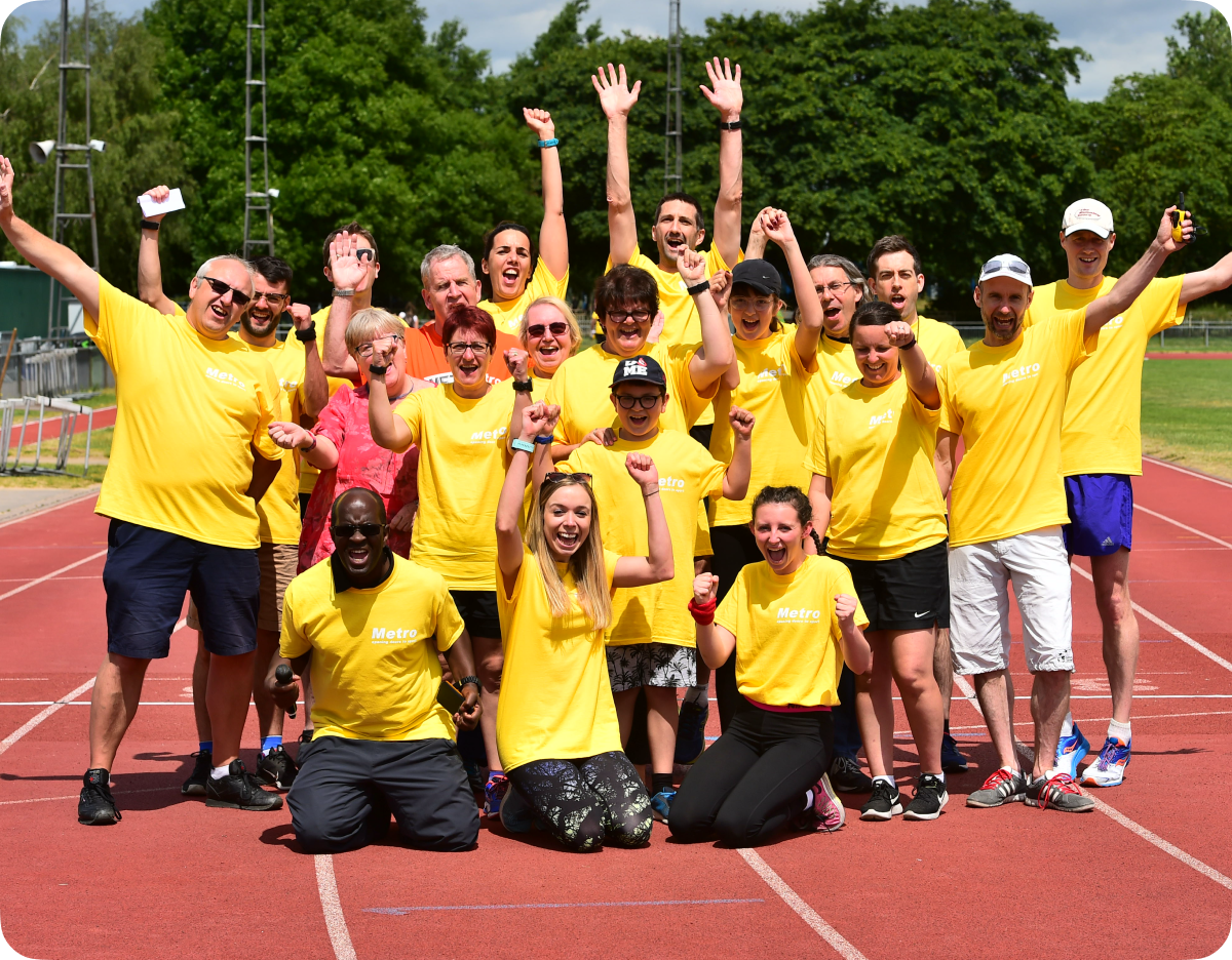 metro blind sport team posing for a group photo