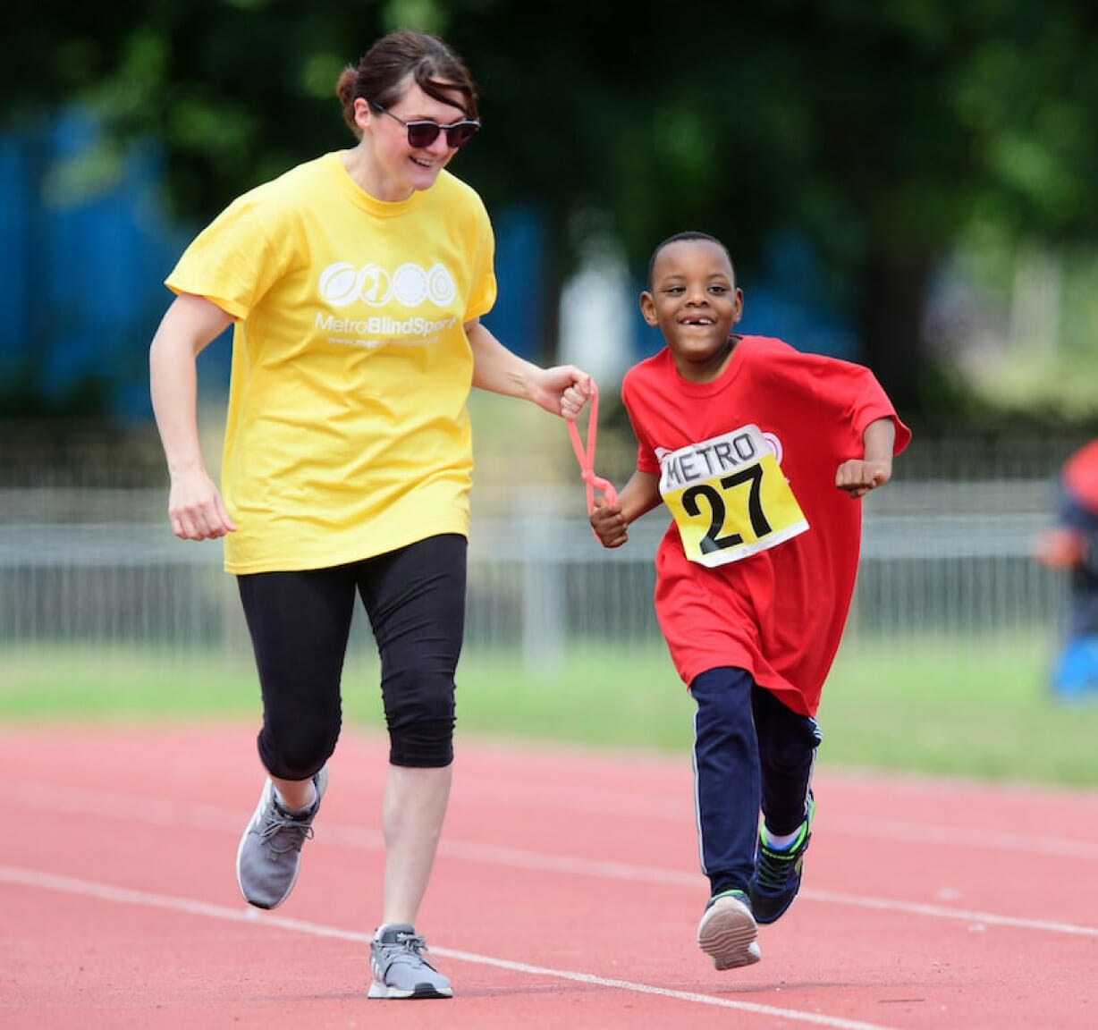 woman running with a child