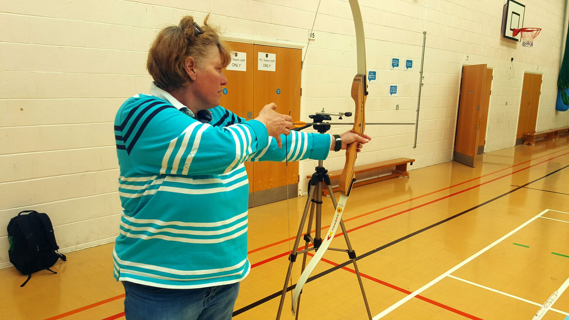 woman playing archery