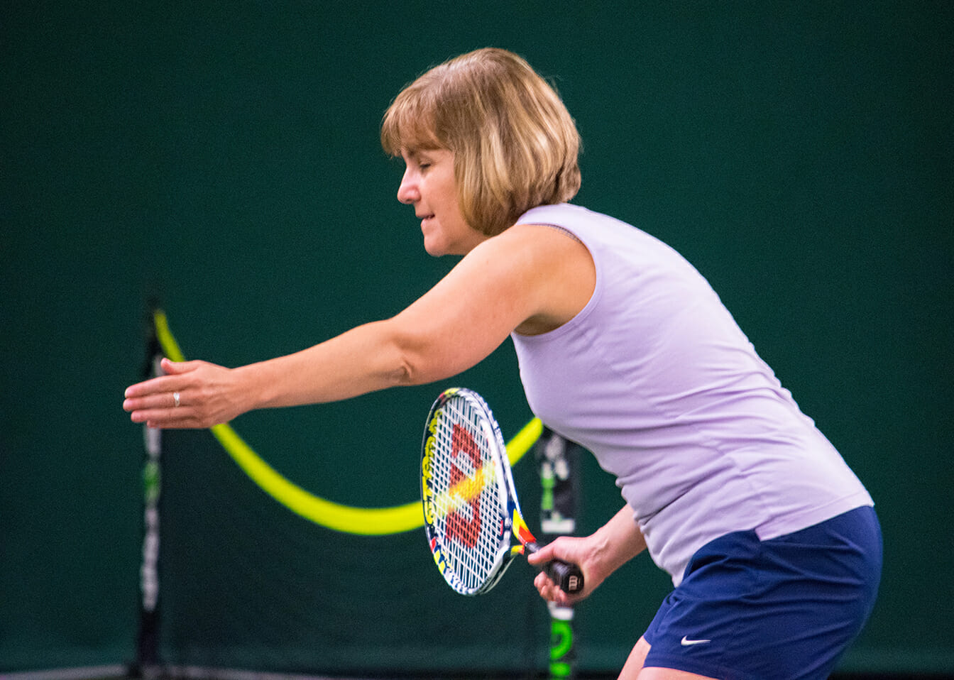 a woman playing tennis