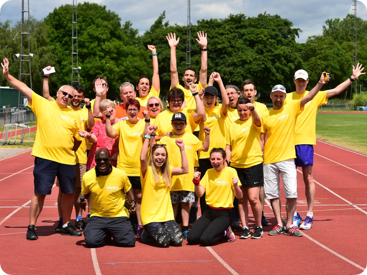 metro blind sports team posing for a group photo